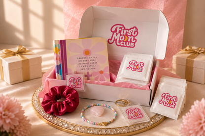 First Moon Club product set on a decorative tray with pink background
